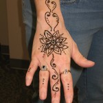 Temporary henna flower tattoos