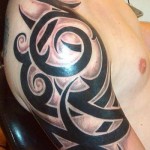 Tribal Style Tattoo on Shoulder
