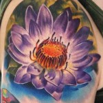 most tattooed lotus flower on shoulder